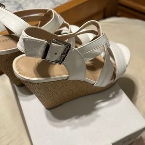 Ladies size 71/2 white wedges .